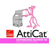 A pink robot is standing next to a machine.
